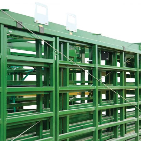 Close up view of the folded corral panels on the side of the portable corral system