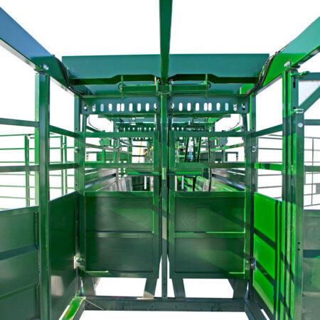 Heeler Portable Corral locking swing gates easily turn the double alley into a single alley and cattle free zone
