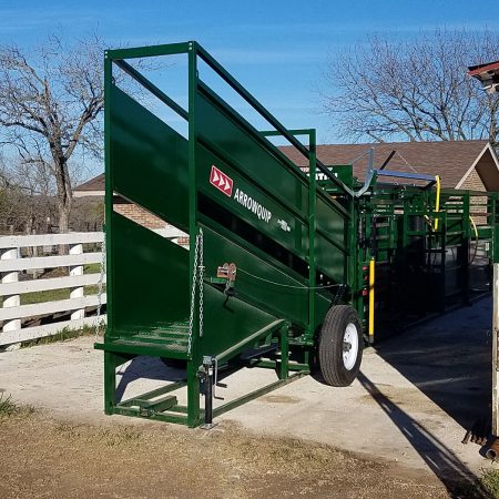 Portable cattle loading chute attached to Q-Catch cattle chute to load out livestock