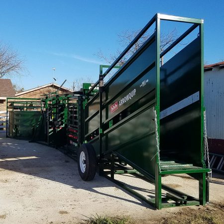 Portable cattle loading chute prepared to load out livestock from handling system