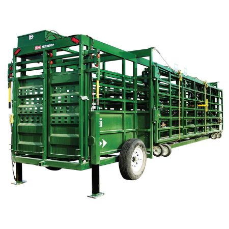 Rear angle side view of the Heeler portable corral system jacked up at the back for wheel removal and set up